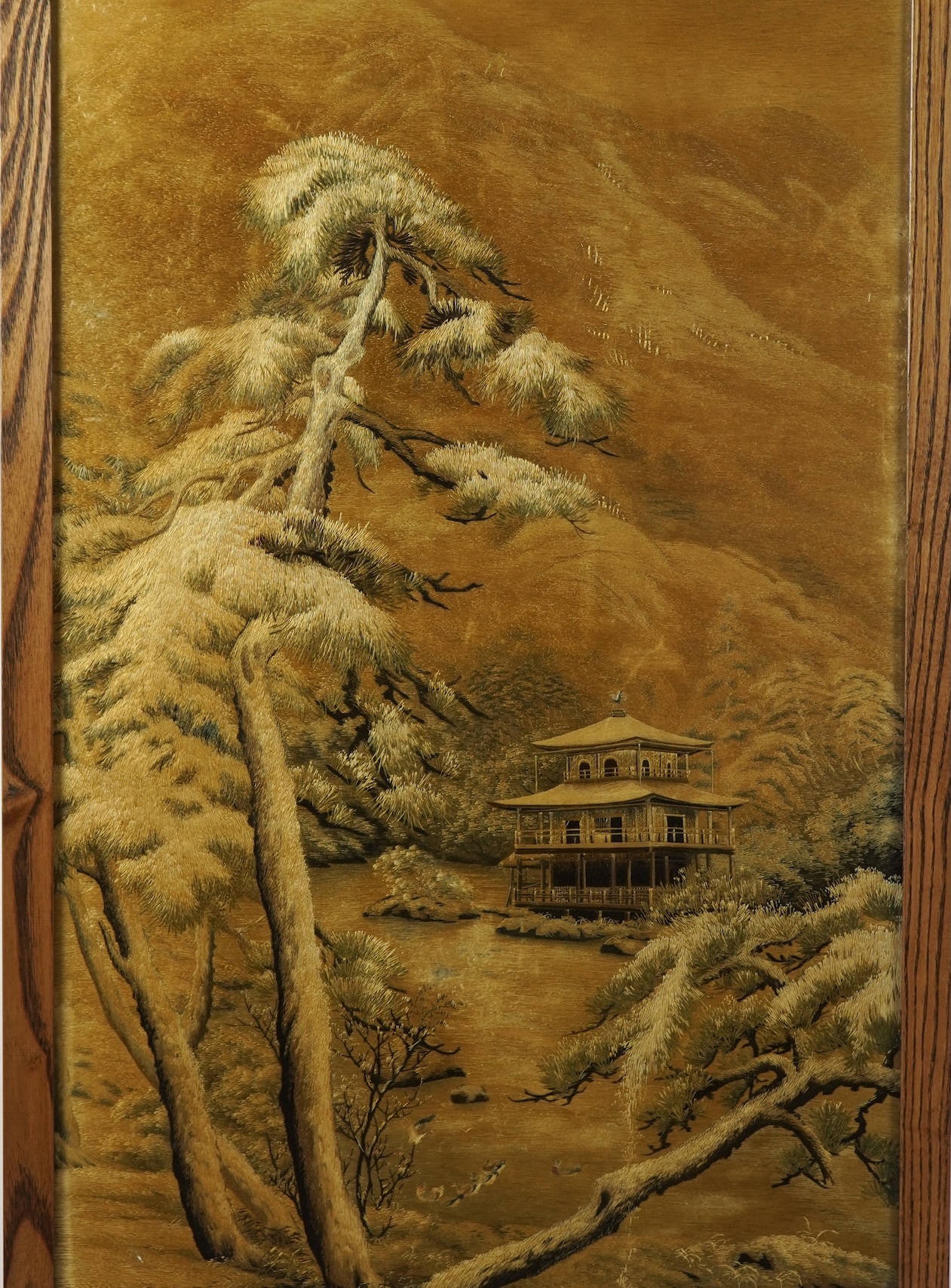 A Japanese embroidered silk picture of Kinkaku-ji, 'Temple of the Golden Pavilion' in Kyoto, Meiji period (1868-1912)